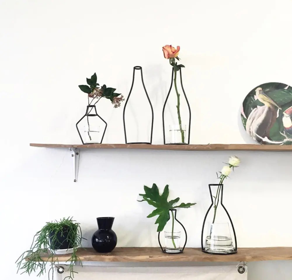 Nordic Style Iron Flower VaseInfuse your space with Nordic charm using our Nordic Style Iron Flower Vase, a stylish and versatile accent for your home.🏡 Nordic Design: Simple yet elegant iron cModernModernNordic Style Iron Flower Vase