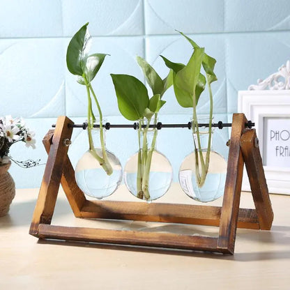 Glass and Wood Vase Planter Table DesktopBring the beauty of nature indoors with our Glass and Wood Vase Planter Table Desktop, a stylish fusion of glass, wood, and greenery.🌿 Dual Material Design: CombineModernModernWood Vase Planter Table Desktop