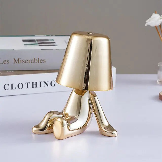 Golden Man LED Touch LampTransform any space instantly with our Golden Man LED Touch Lamp. With a simple touch, activate the warm LED glow and enjoy long-lasting brightness without the need ModernModernGolden Man LED Touch Lamp