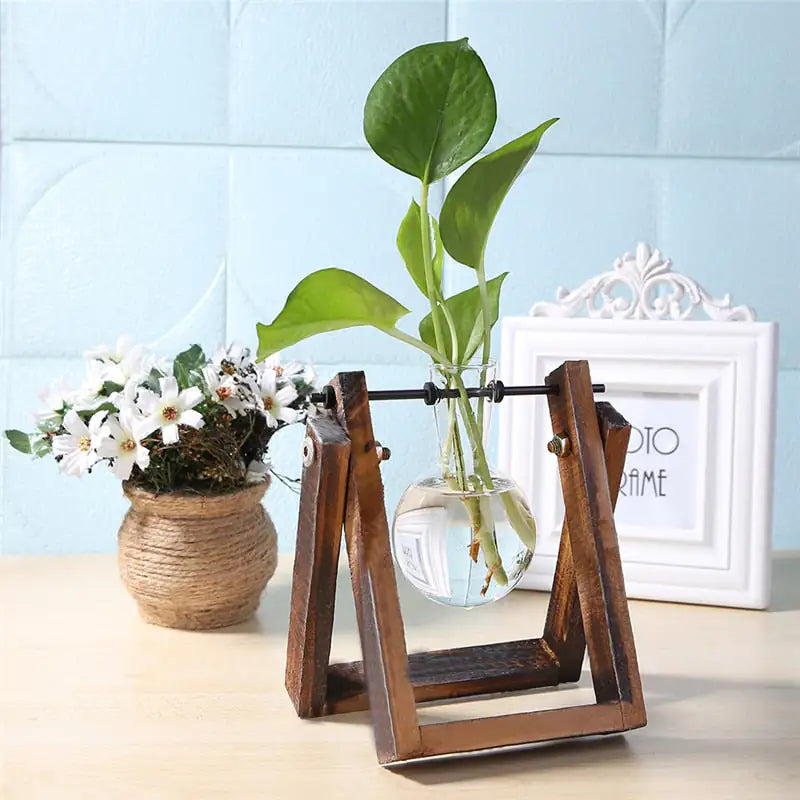 Glass and Wood Vase Planter Table DesktopBring the beauty of nature indoors with our Glass and Wood Vase Planter Table Desktop, a stylish fusion of glass, wood, and greenery.🌿 Dual Material Design: CombineModernModernWood Vase Planter Table Desktop