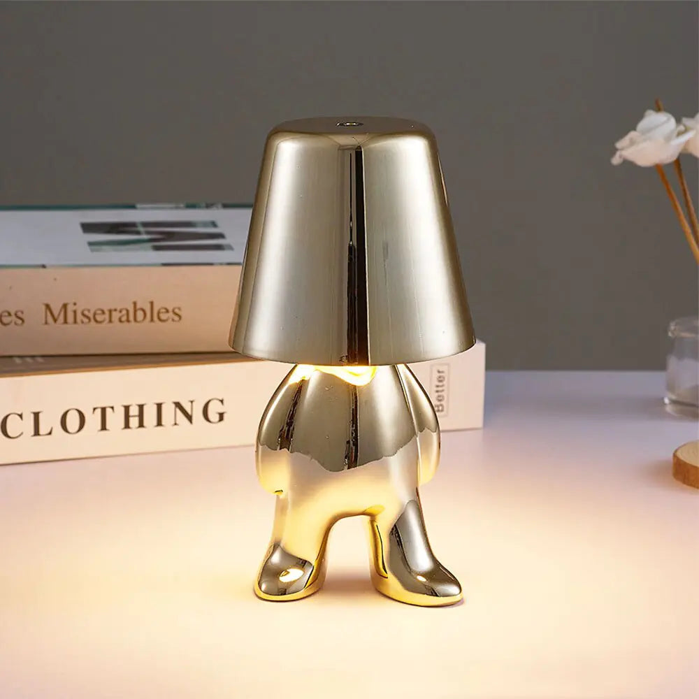 Golden Man LED Touch LampTransform any space instantly with our Golden Man LED Touch Lamp. With a simple touch, activate the warm LED glow and enjoy long-lasting brightness without the need ModernModernGolden Man LED Touch Lamp