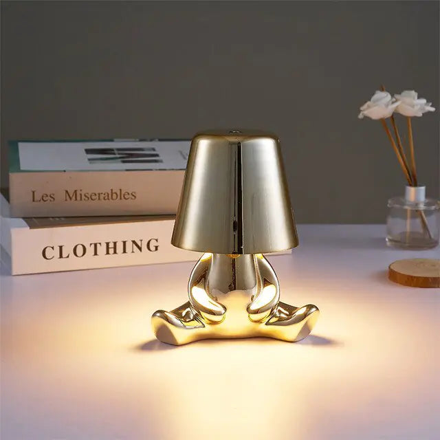 Golden Man LED Touch LampTransform any space instantly with our Golden Man LED Touch Lamp. With a simple touch, activate the warm LED glow and enjoy long-lasting brightness without the need ModernModernGolden Man LED Touch Lamp