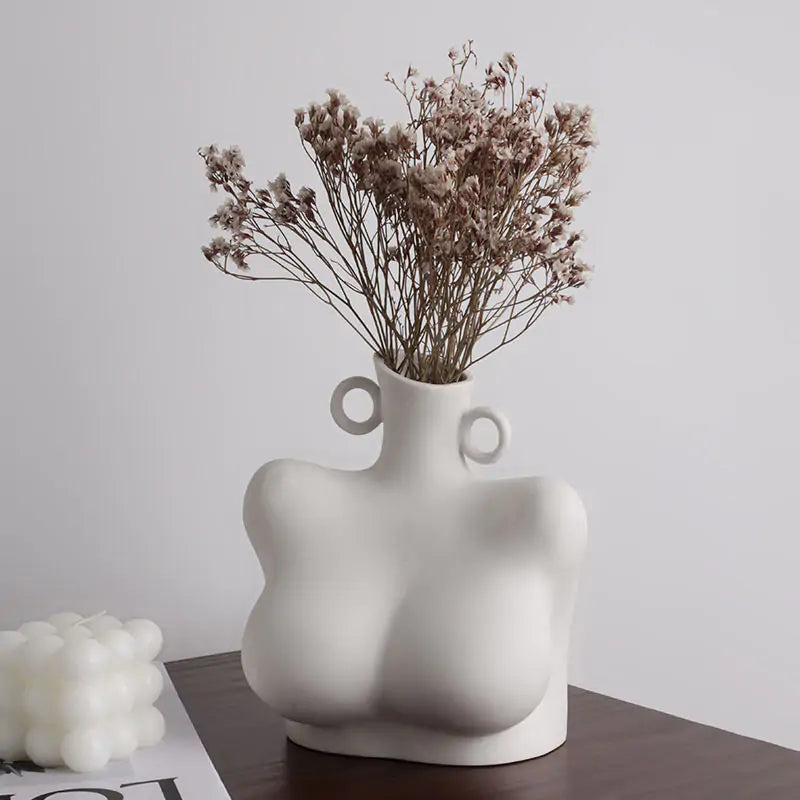 Home Decor Sculpture Ceramic VaseElevate your home decor with our Home Decor Sculpture Ceramic Vase, a captivating blend of functionality and artistic expression.🏺 Sculptural Design: A unique and eModernModernHome Decor Sculpture Ceramic Vase