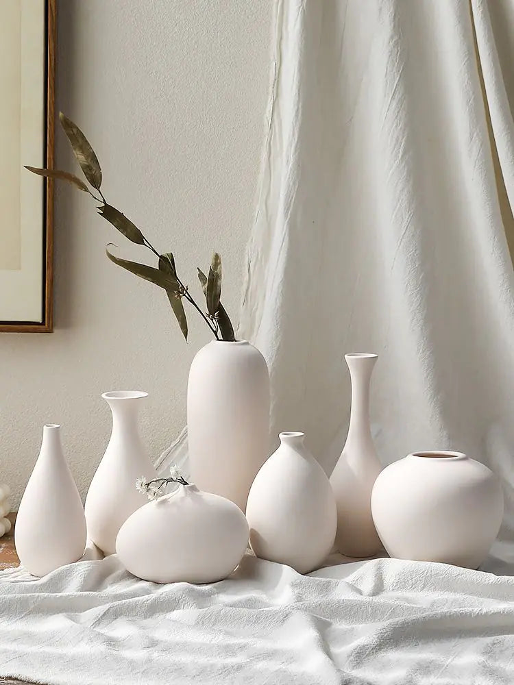 Chinese Ceramic VaseEnhance your decor with the timeless beauty of our Chinese Ceramic Vase, a traditional yet elegant addition to your home.🈴 Classic Chinese Design: Features intricatModernModernChinese Ceramic Vase