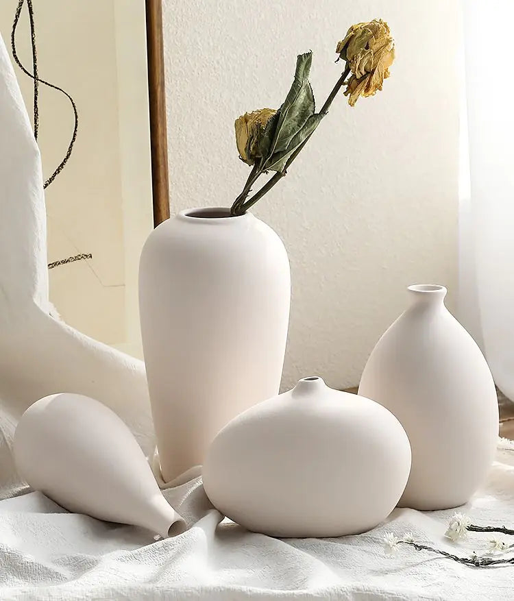 Chinese Ceramic VaseEnhance your decor with the timeless beauty of our Chinese Ceramic Vase, a traditional yet elegant addition to your home.🈴 Classic Chinese Design: Features intricatModernModernChinese Ceramic Vase