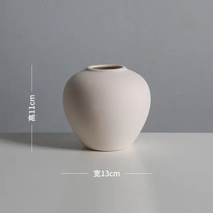 Chinese Ceramic VaseEnhance your decor with the timeless beauty of our Chinese Ceramic Vase, a traditional yet elegant addition to your home.🈴 Classic Chinese Design: Features intricatModernModernChinese Ceramic Vase