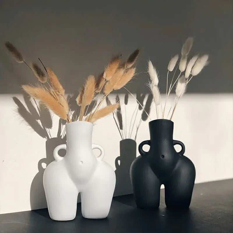 Home Decor Sculpture Ceramic VaseElevate your home decor with our Home Decor Sculpture Ceramic Vase, a captivating blend of functionality and artistic expression.🏺 Sculptural Design: A unique and eModernModernHome Decor Sculpture Ceramic Vase