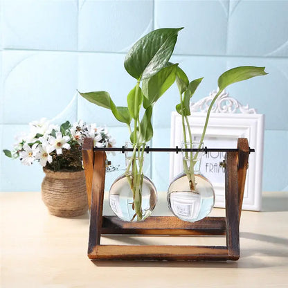 Glass and Wood Vase Planter Table DesktopBring the beauty of nature indoors with our Glass and Wood Vase Planter Table Desktop, a stylish fusion of glass, wood, and greenery.🌿 Dual Material Design: CombineModernModernWood Vase Planter Table Desktop